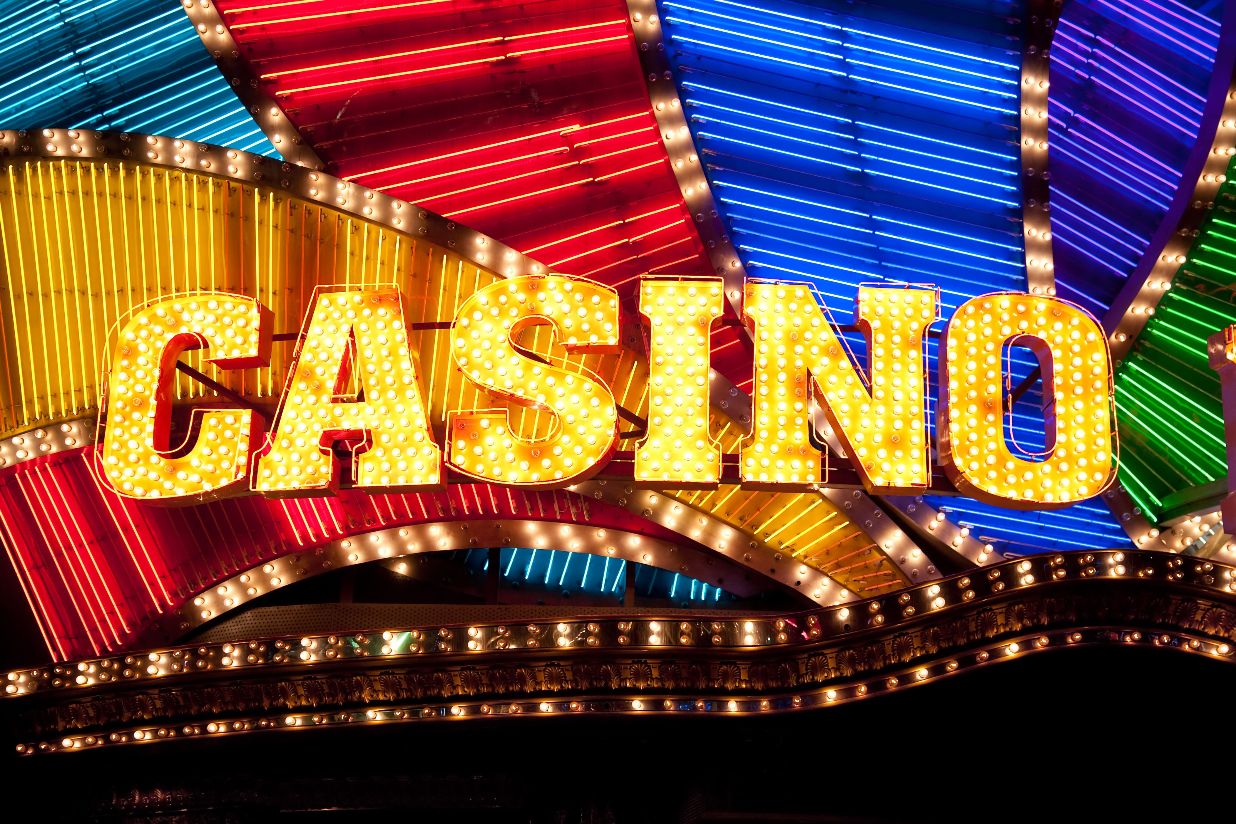 A stunning photo of the iconic, glass-paneled Ocean Casino Resort tower against the Atlantic City skyline.